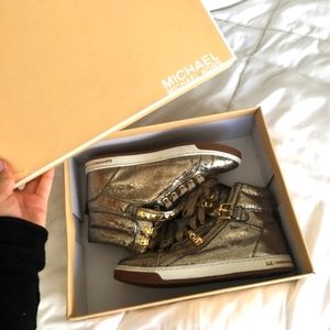 Michael kors size 7, women's gold, glitter, high tops.(with zipper)